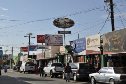 Street view showing a number of Los Algodones dental clinics.